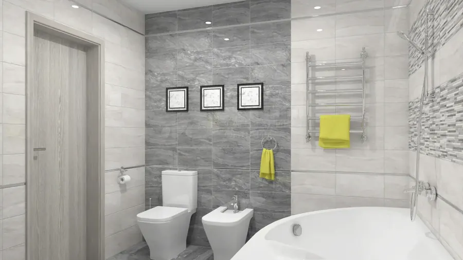 Modern bathroom with gray stone-look tile and a white tub